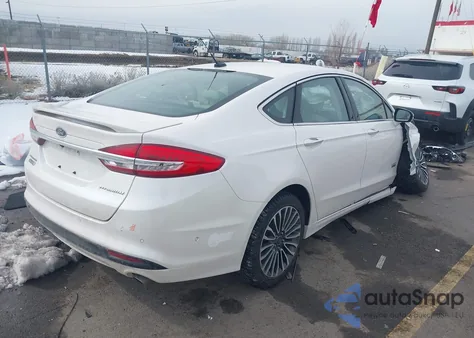 2017 Ford Fusion Energi Titanium from USA, damaged, VIN 3FA6P0SU4HR380502